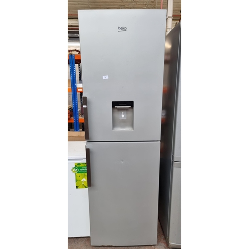 805 - A Beko upright fridge freezer with water dispenser approx.190cm high