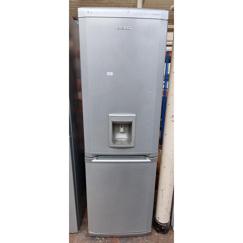 806 - A Beko A Class frost free upright fridge freezer with water dispenser approx.186cm high