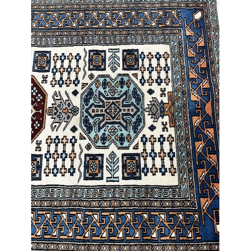 202 - A late 20th century Kazak rug - approx. 163cm x 94cm