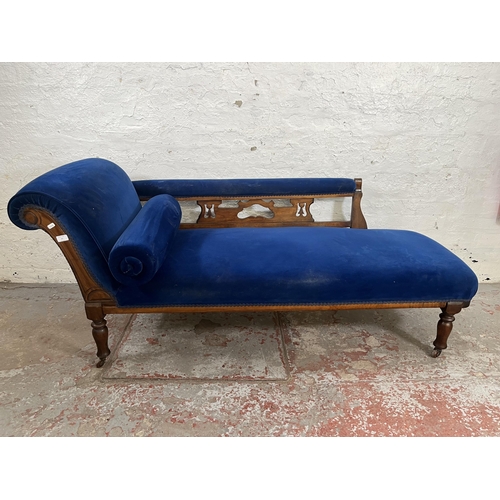 27 - A Victorian mahogany and blue fabric upholstered chaise lounge