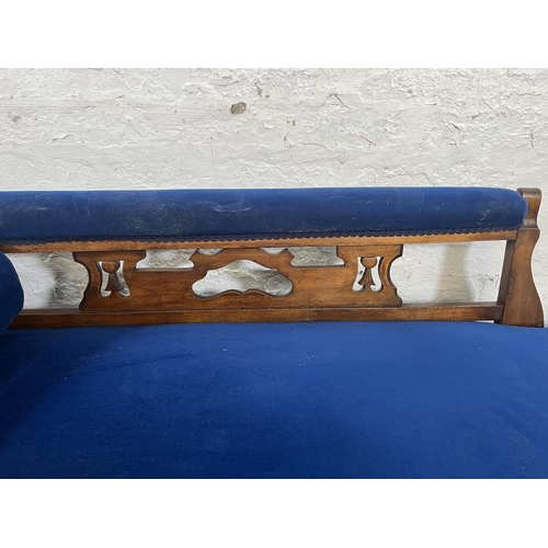 27 - A Victorian mahogany and blue fabric upholstered chaise lounge