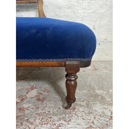 27 - A Victorian mahogany and blue fabric upholstered chaise lounge