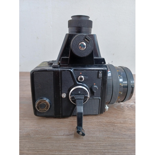 581 - A Zenza Bronica SQ-A 6x6 medium format SLR camera fitted with chimney finder, 120 film back and Zenz... 