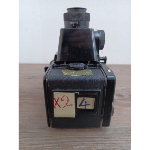 581 - A Zenza Bronica SQ-A 6x6 medium format SLR camera fitted with chimney finder, 120 film back and Zenz... 