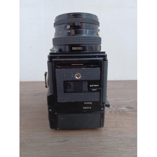 581 - A Zenza Bronica SQ-A 6x6 medium format SLR camera fitted with chimney finder, 120 film back and Zenz... 