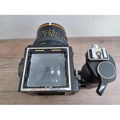 582 - A Zenza Bronica SQ-A 6x6 medium format SLR camera fitted with Speed Grip and Zenzanon-S 1:3.5 f=50mm... 