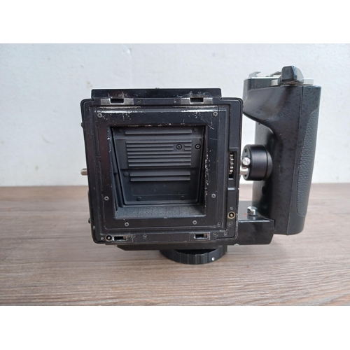 582 - A Zenza Bronica SQ-A 6x6 medium format SLR camera fitted with Speed Grip and Zenzanon-S 1:3.5 f=50mm... 