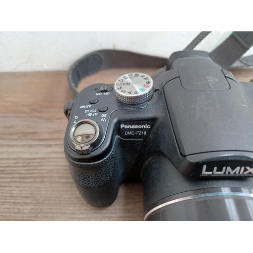 587 - Four Panasonic Lumix digital cameras, one DMC-FX150 14mp, one DMC-FZ10 4mp, one DMC-FZ18 and one DMC... 