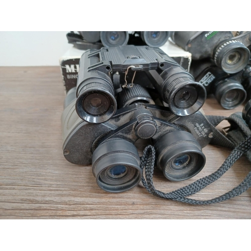 588 - Nine pairs of binoculars to include cased Lieberman & Gortz 10 x 50, boxed Miranda 10 x 50 VG, Inpro... 