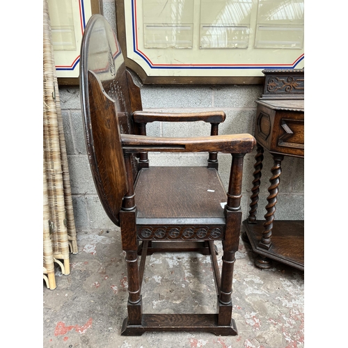 3 - A mid 20th century carved oak monk's chair