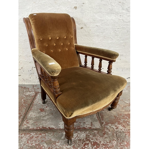 35 - A Victorian mahogany and fabric upholstered armchair