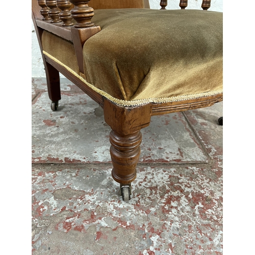 35 - A Victorian mahogany and fabric upholstered armchair