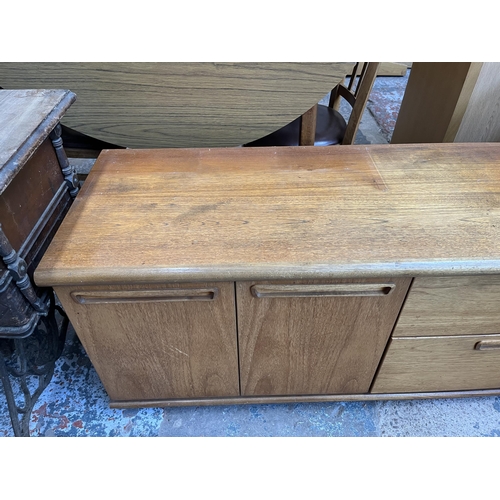 42 - A Meredew teak low sideboard