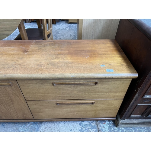 42 - A Meredew teak low sideboard