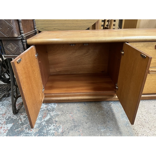 42 - A Meredew teak low sideboard