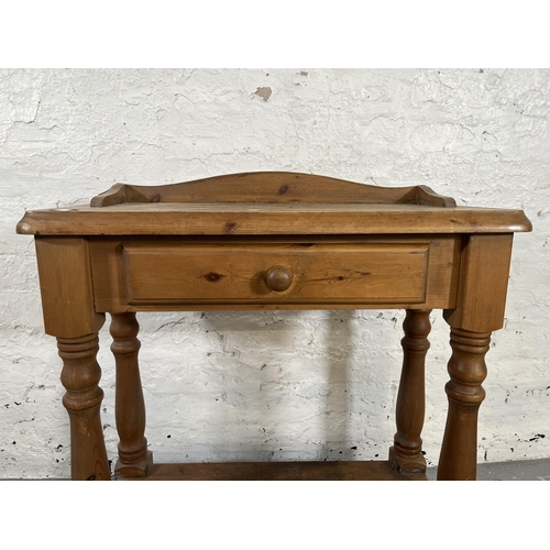 44 - A Victorian style pine two tier side table with single drawer