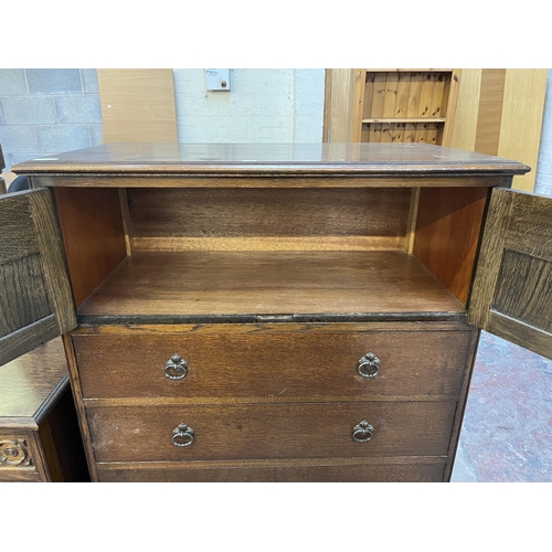 49 - A Crown Ay carved oak tallboy chest of drawers - approx. 123cm high x 87cm wide x 48cm deep