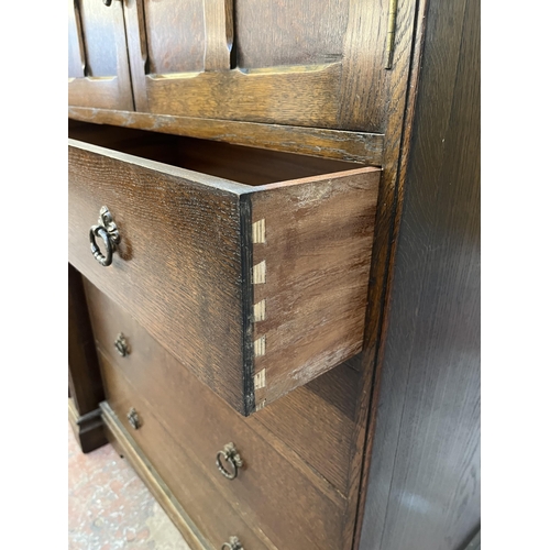 49 - A Crown Ay carved oak tallboy chest of drawers - approx. 123cm high x 87cm wide x 48cm deep