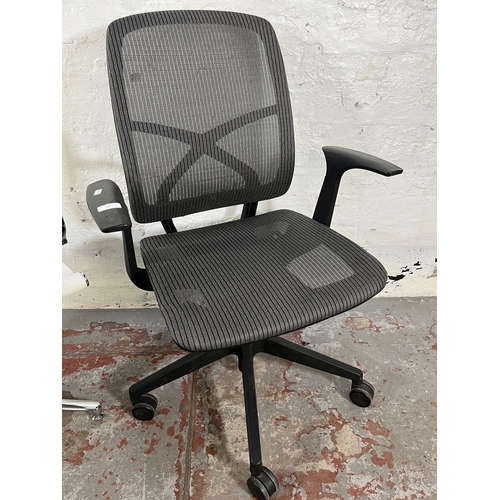 53 - Two modern swivel office desk chairs