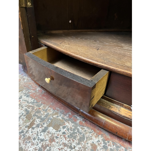 56 - A Georgian inlaid mahogany bow front wall mountable corner cabinet