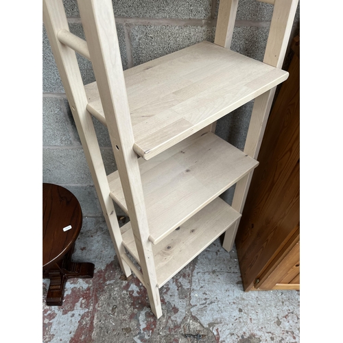 7 - A modern pine five tier shelving unit