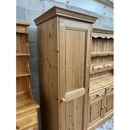 9 - A modern solid pine single door wardrobe - approx. 192cm high x 59cm wide x 60cm deep