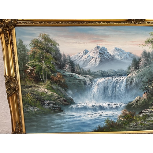 211 - A gilt framed oil on canvas of a landscape scene by R. Danford - approx. 73cm high x 134cm wide