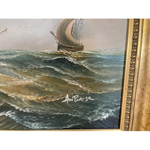 217 - A gilt framed oil on canvas of sailing ships, signed Ambrose - approx. 51cm high x 61cm wide