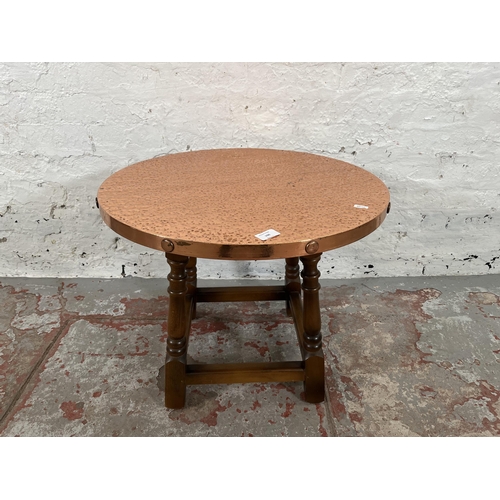 100 - A beech and copper top circular side table