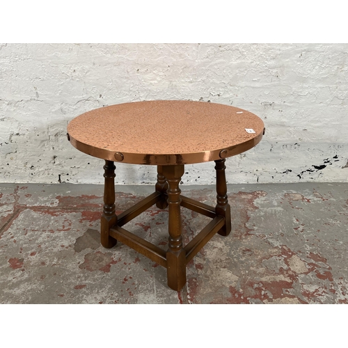 100 - A beech and copper top circular side table