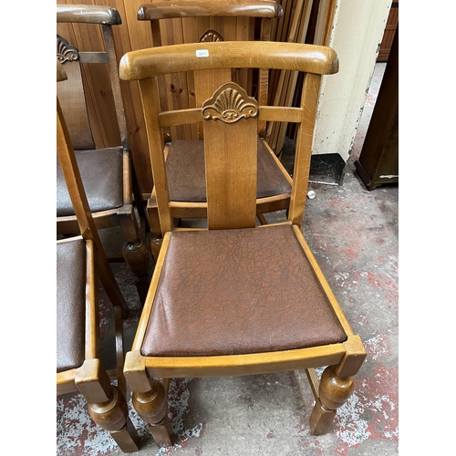 102 - A set of six 1930s style oak dining chairs with baluster supports