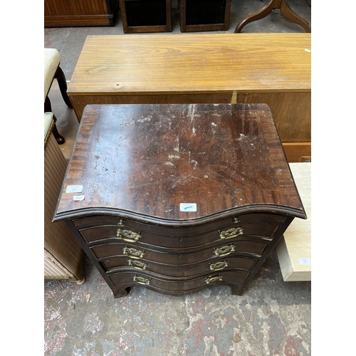 106 - A Georgian style mahogany serpentine chest of four drawers with brushing slide - approx. 75cm high x... 