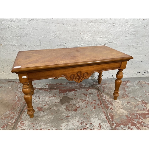 118 - A French style oak parquet top rectangular coffee table