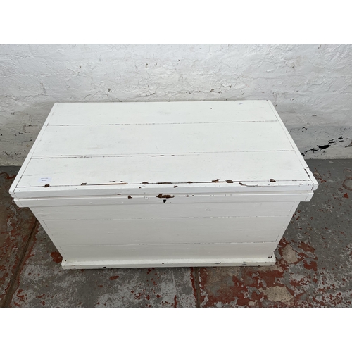 119 - A Victorian white painted pine blanket box