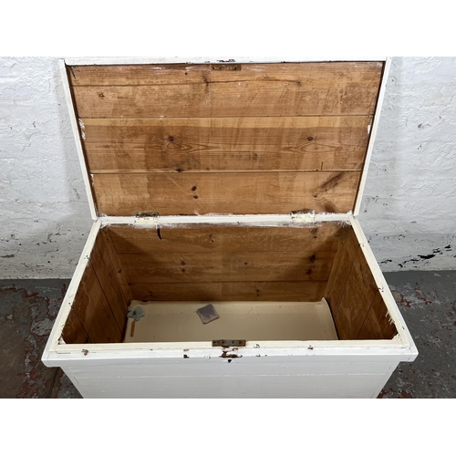 119 - A Victorian white painted pine blanket box