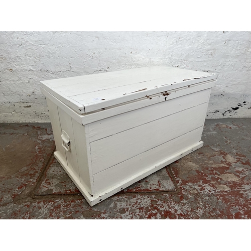 119 - A Victorian white painted pine blanket box