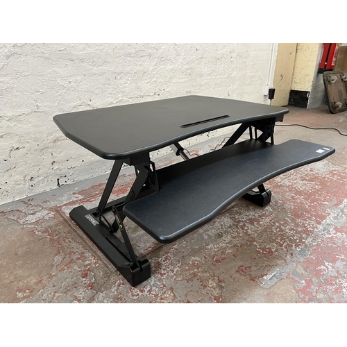 123 - A Duronic adjustable sit stand desk