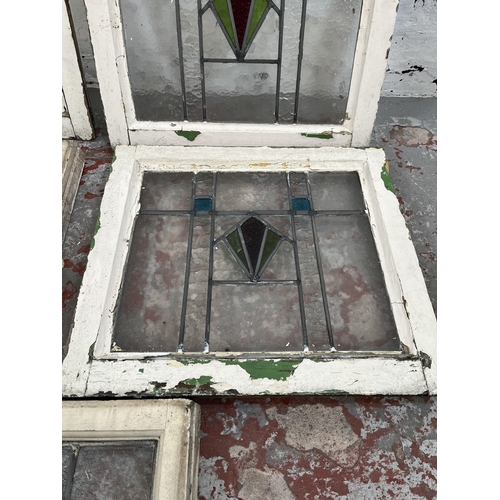 140A - Five 1930s stained glass windows - approx. 48cm high x 52cm wide