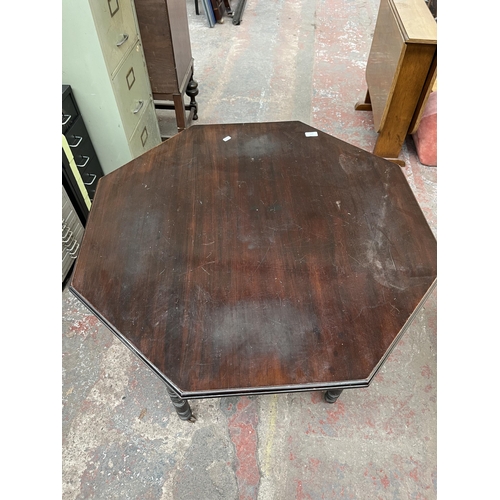 144 - A late 19th/early 20th century mahogany octagonal occasional table with lower shelf