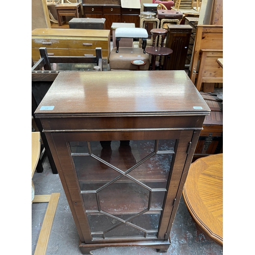 146 - A Georgian style mahogany astral glazed display cabinet with bracket supports