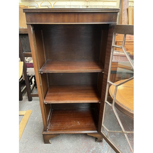 146 - A Georgian style mahogany astral glazed display cabinet with bracket supports