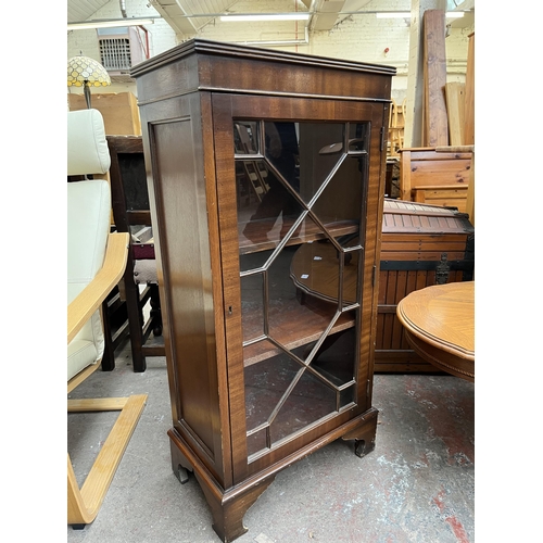 146 - A Georgian style mahogany astral glazed display cabinet with bracket supports