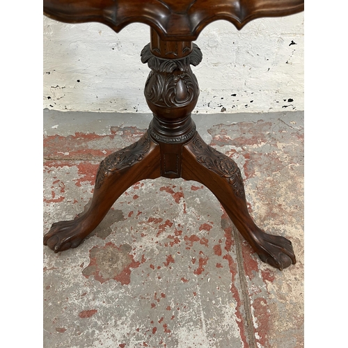 156 - A Georgian style mahogany pie crust edge tilt top occasional table with carved tripod pedestal and b... 