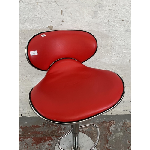 158 - A modern red leatherette and chrome plated kitchen barstool retailed by Actona, Denmark