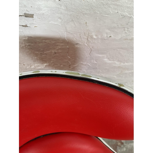 158 - A modern red leatherette and chrome plated kitchen barstool retailed by Actona, Denmark