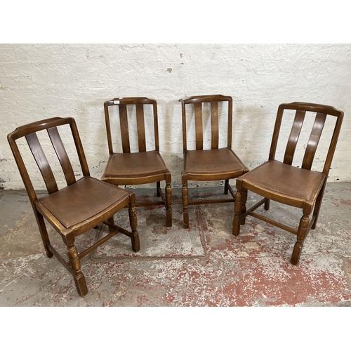 160 - Four oak dining chairs with brown leatherette upholstery