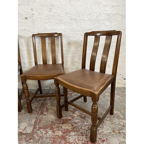 160 - Four oak dining chairs with brown leatherette upholstery