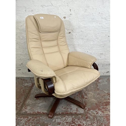 162 - A Stressless style cream leather swivel reclining armchair and matching footstool