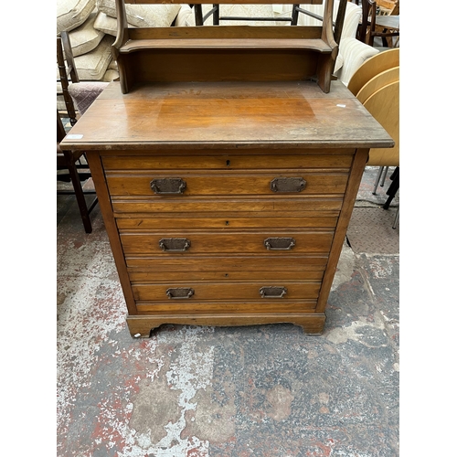 165 - An Edwardian satinwood dressing chest with three drawers and upper mirror