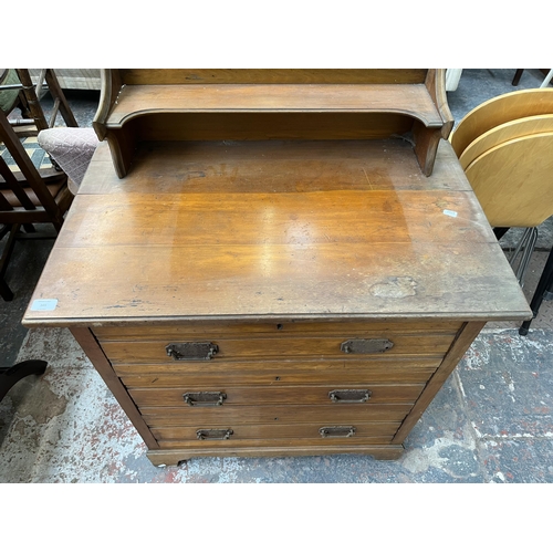 165 - An Edwardian satinwood dressing chest with three drawers and upper mirror